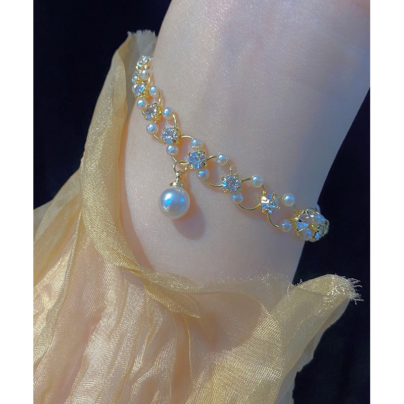 Stylish Gold Copper Alloy Zircon Pearl Charm Bracelet TX033