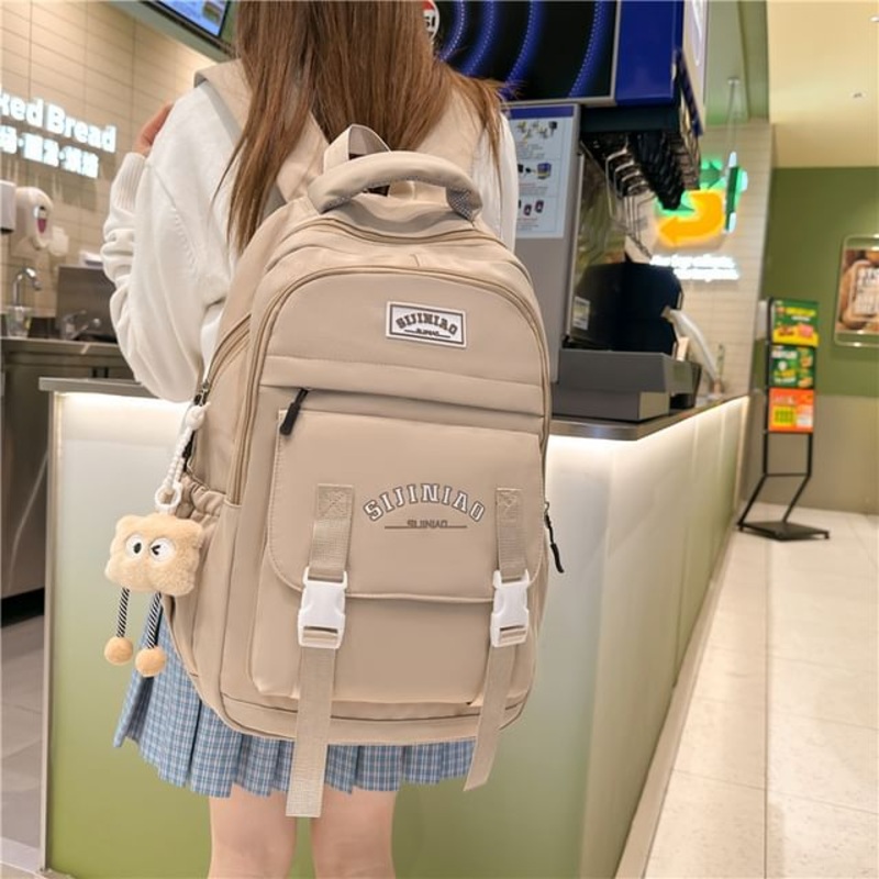 Backpack Zip Lettering|With Charm – Backpack – Black|With Charm – Backpack – Blue|With Charm – Backpack – Khaki|With Charm – Backpack – Red|With Charm – Backpack – White|Without Charm – Backpack – Black|Without Charm – Backpack – Blue|Without Charm – Back