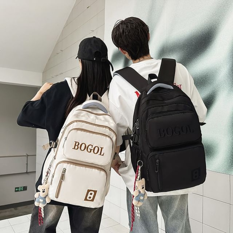 Zip Backpack Lettering|With Charm – Backpack – Black|With Charm – Backpack – Green|With Charm – Backpack – Khaki|With Charm – Backpack – White|Without Charm – Backpack – Black|Without Charm – Backpack – Green|Without Charm – Backpack – Khaki|Without Charm
