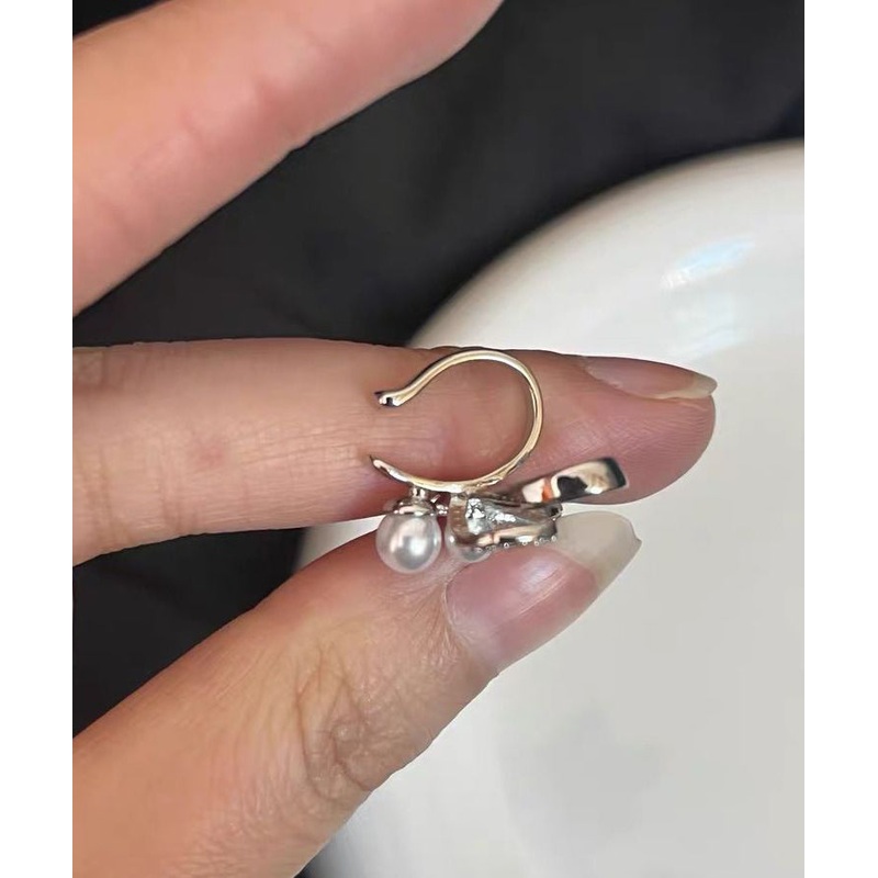 Unique White Metal Zircon Pearl Hollow Out Bow Stud Earrings ET025